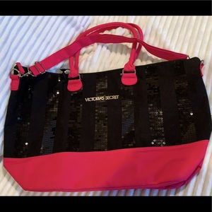 NWOT Victoria Secret bag. Black sequins with pink trim.